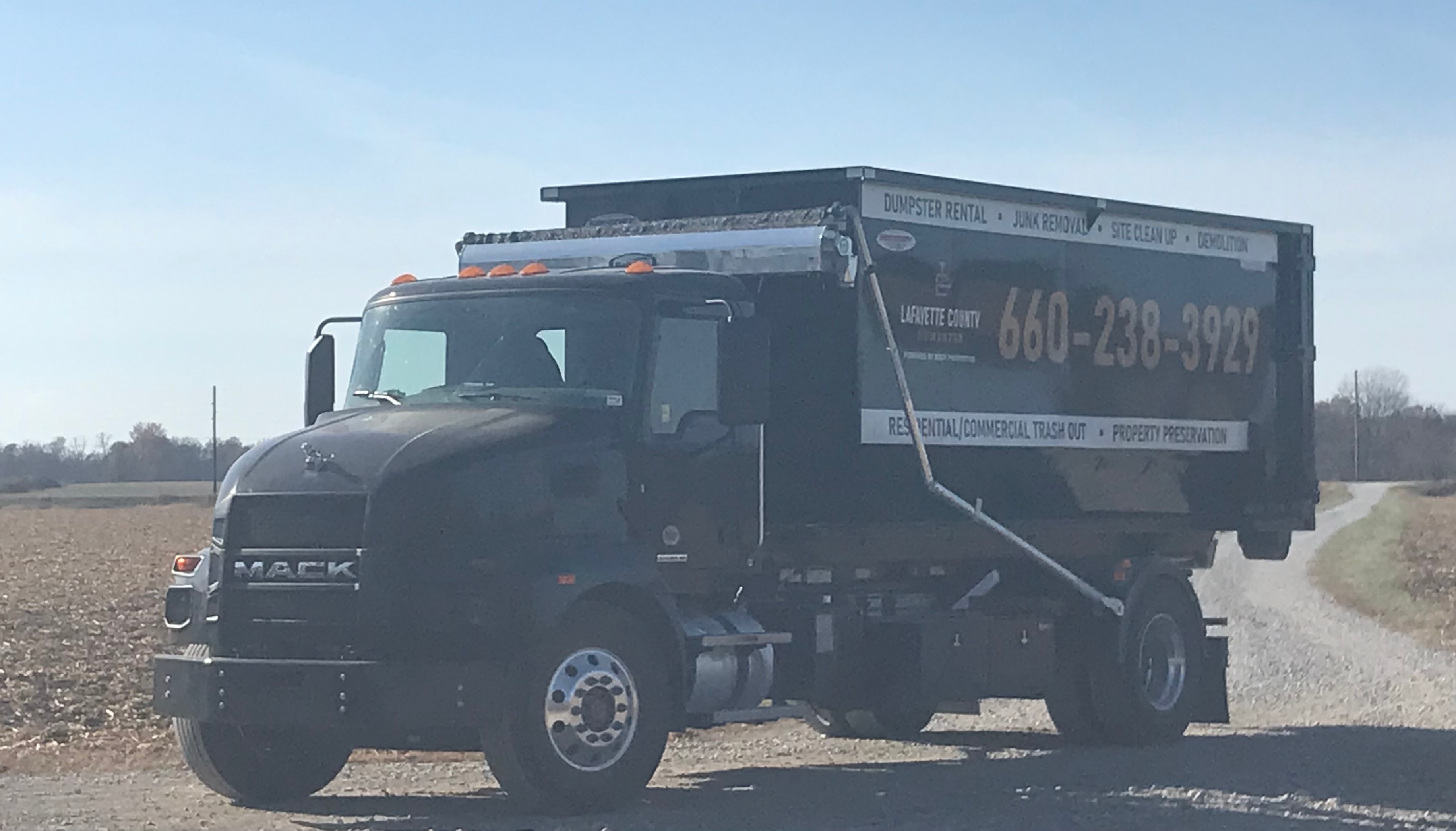 Lafayette County Dumpster with truck